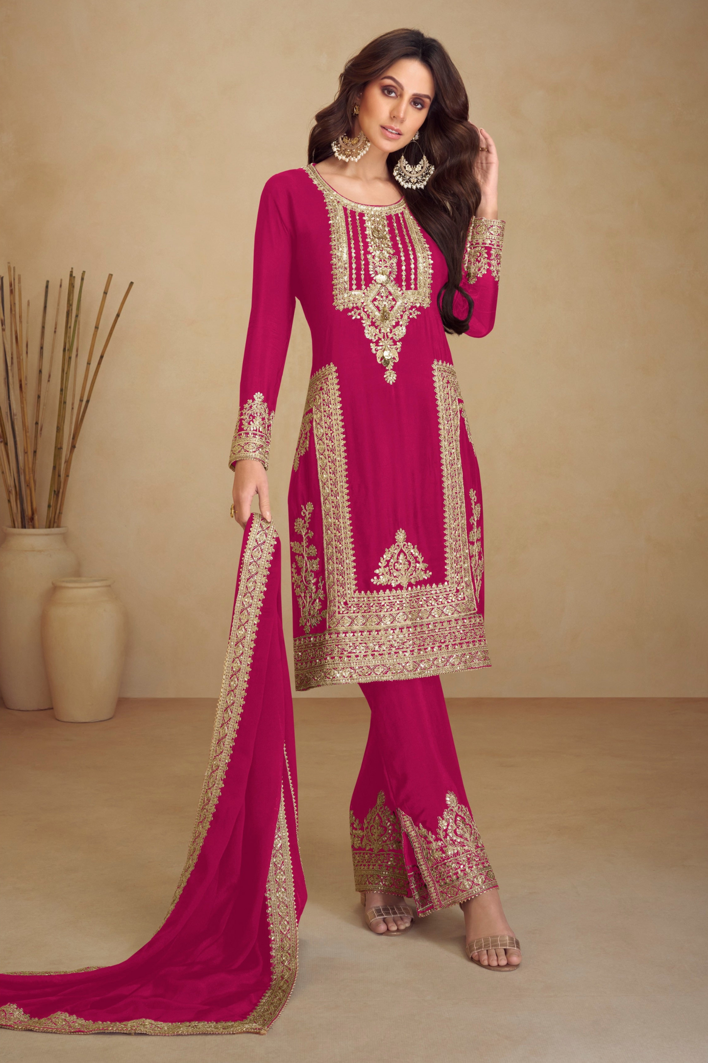 Pink salwar kameez is cheerful and lovely. Perfect for celebrations.