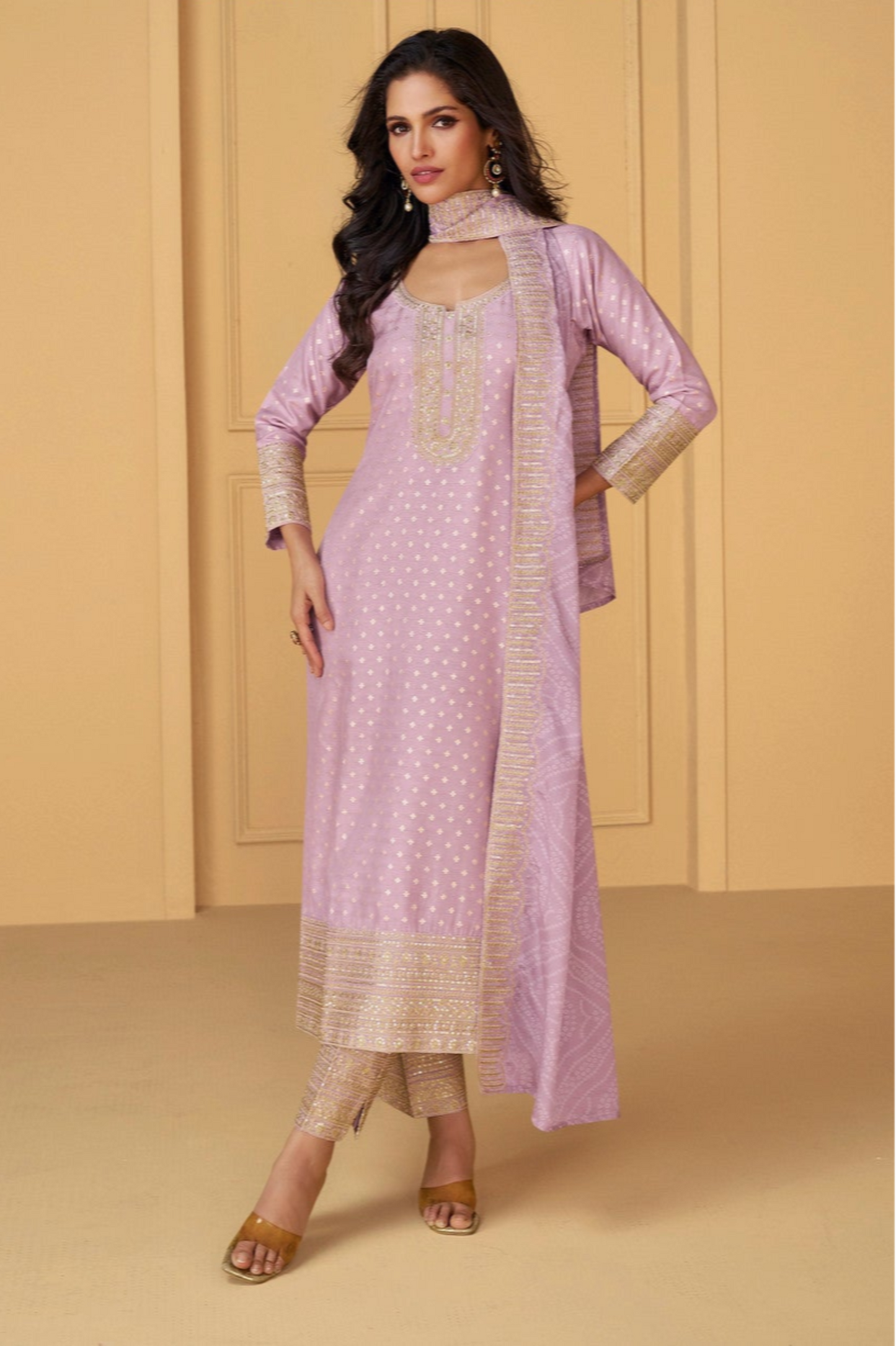 Pink salwar kameez is cheerful and lovely. Perfect for celebrations.