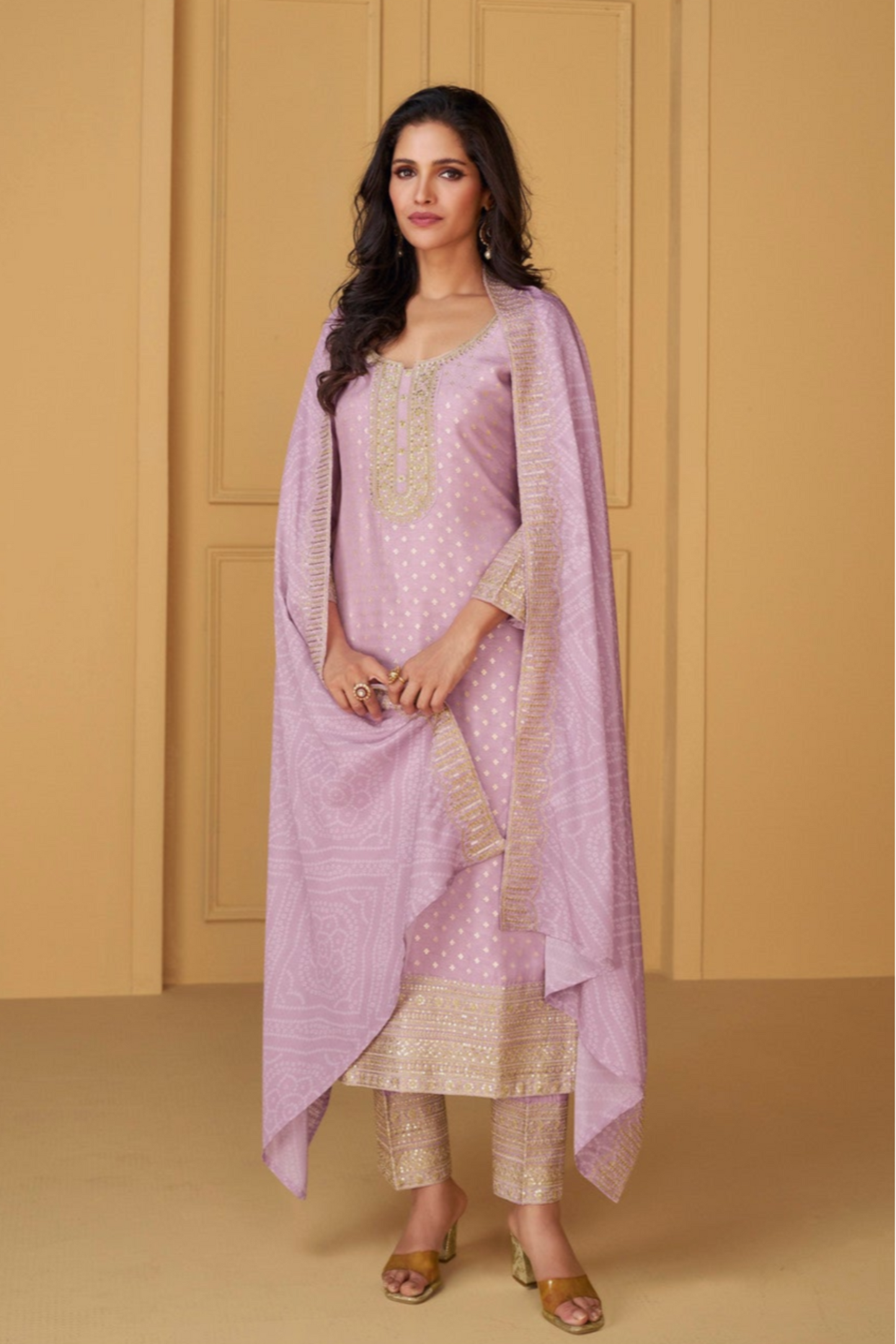 Pink salwar kameez is cheerful and lovely. Perfect for celebrations.