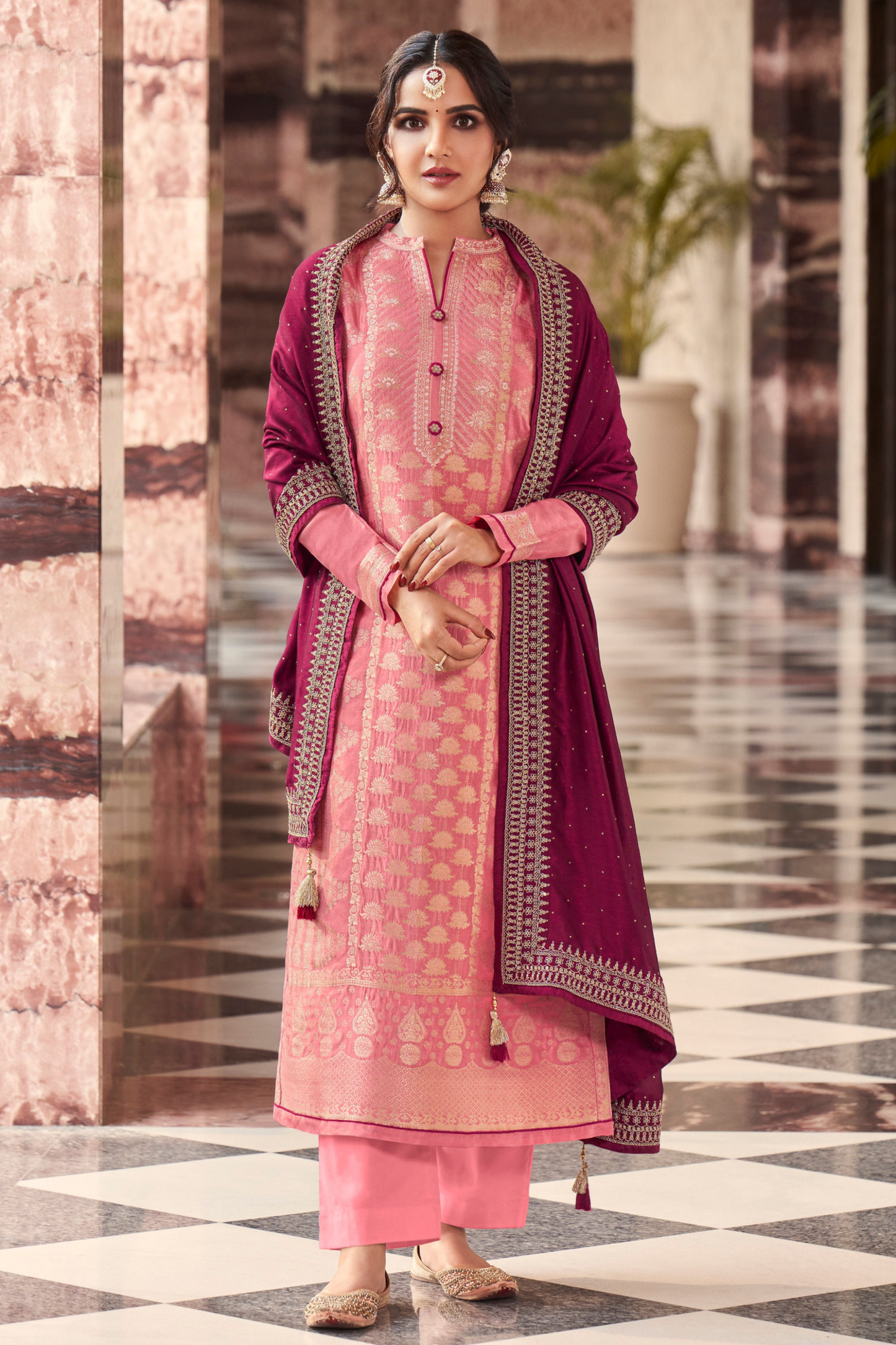 Pink salwar kameez is cheerful and lovely. Perfect for celebrations.