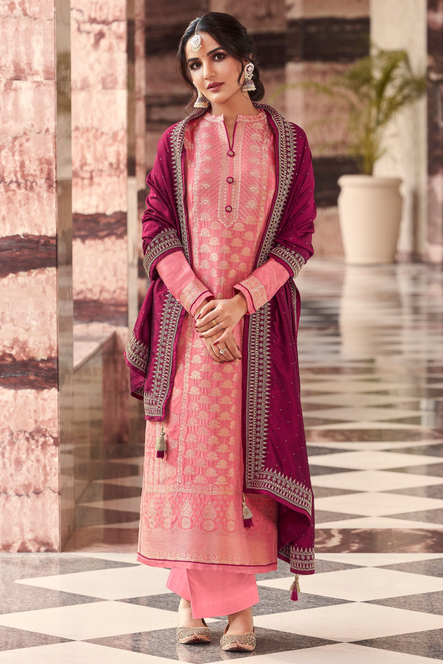 Pink salwar kameez is cheerful and lovely. Perfect for celebrations.