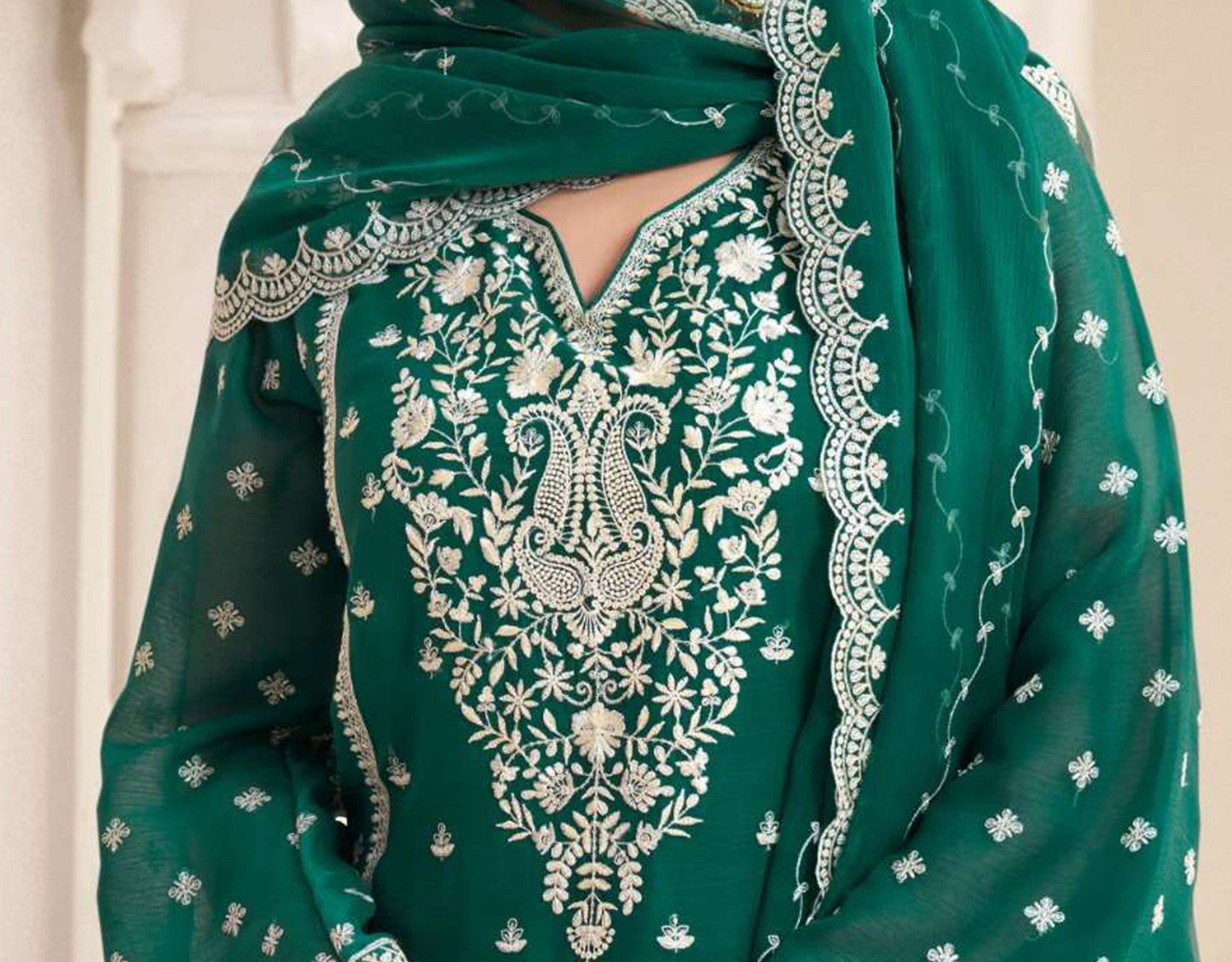 Teal salwar kameez is cool and refreshing. It blends blue and green for a unique look