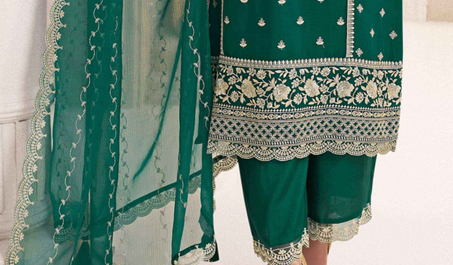 Teal salwar kameez is cool and refreshing. It blends blue and green for a unique look