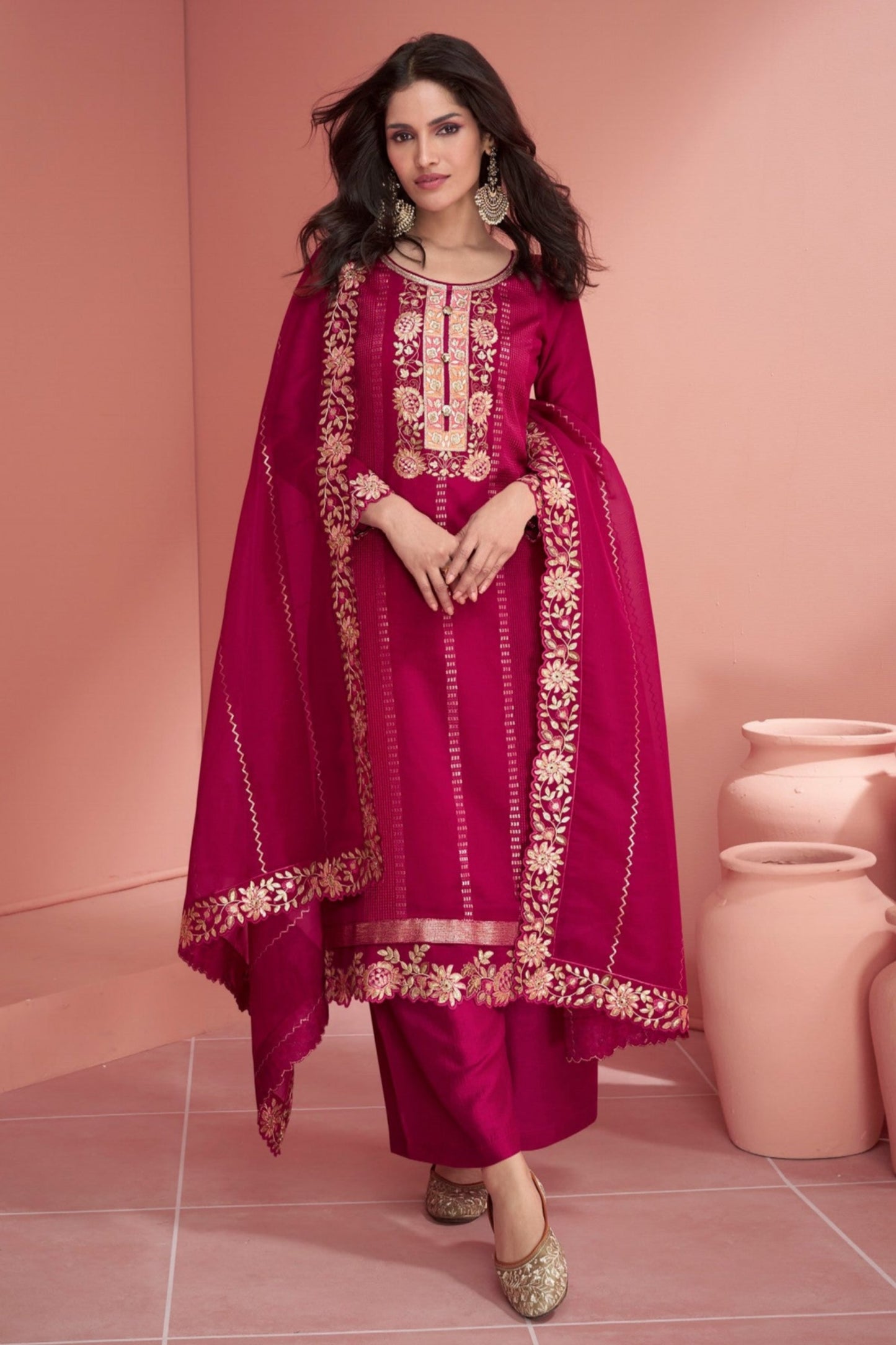 Pink salwar kameez is cheerful and lovely. Perfect for celebrations.