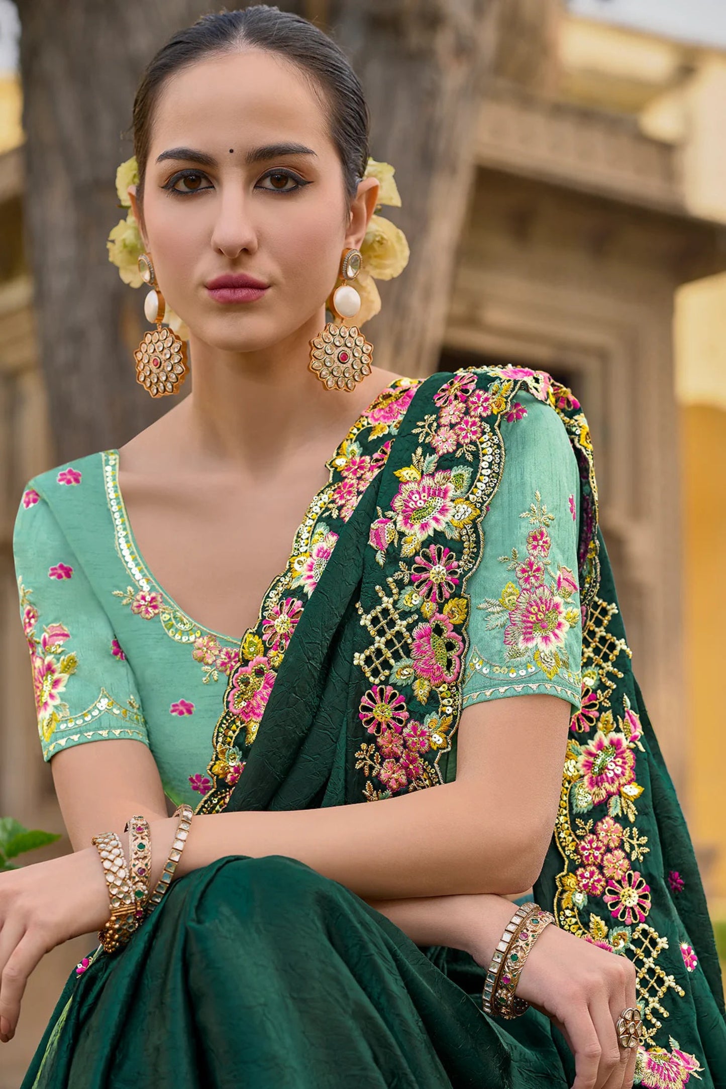 Green Saree symbolizes freshness and festivity – great for Mehndi or family gatherings.