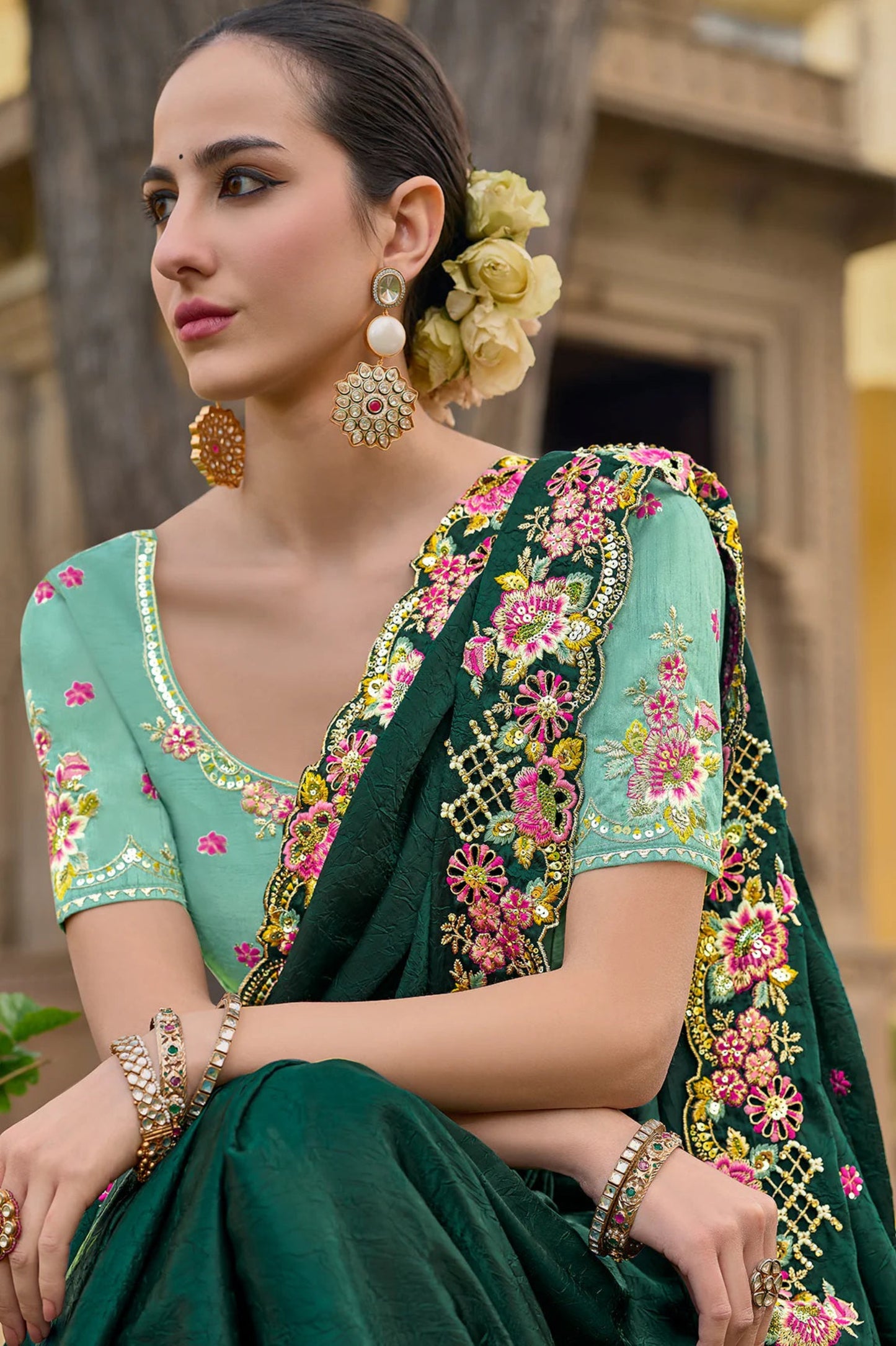 Green Saree symbolizes freshness and festivity – great for Mehndi or family gatherings.