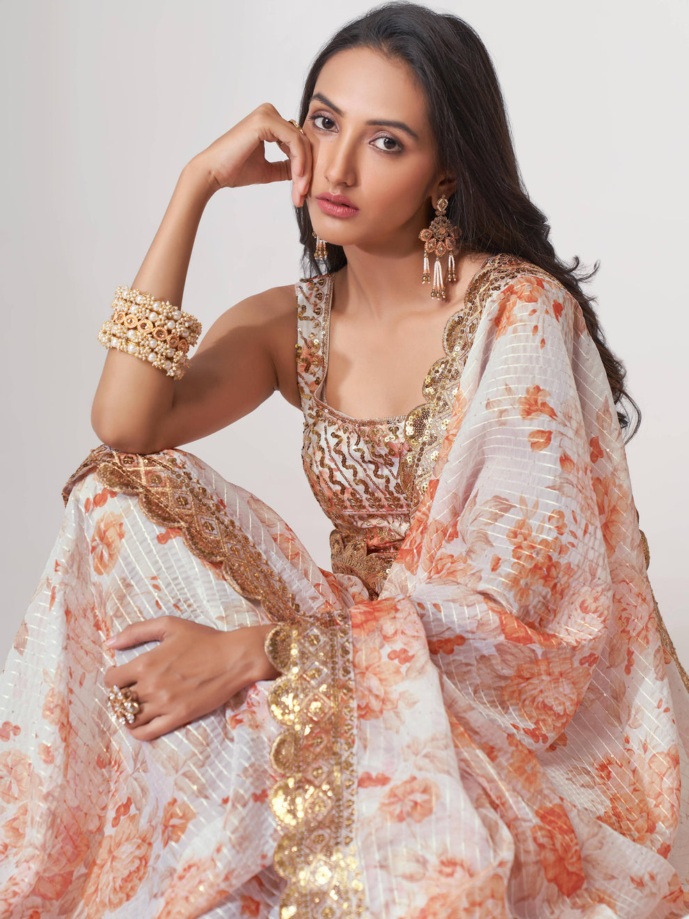 White Saree stands for purity and class – ideal for serene and sacred events.