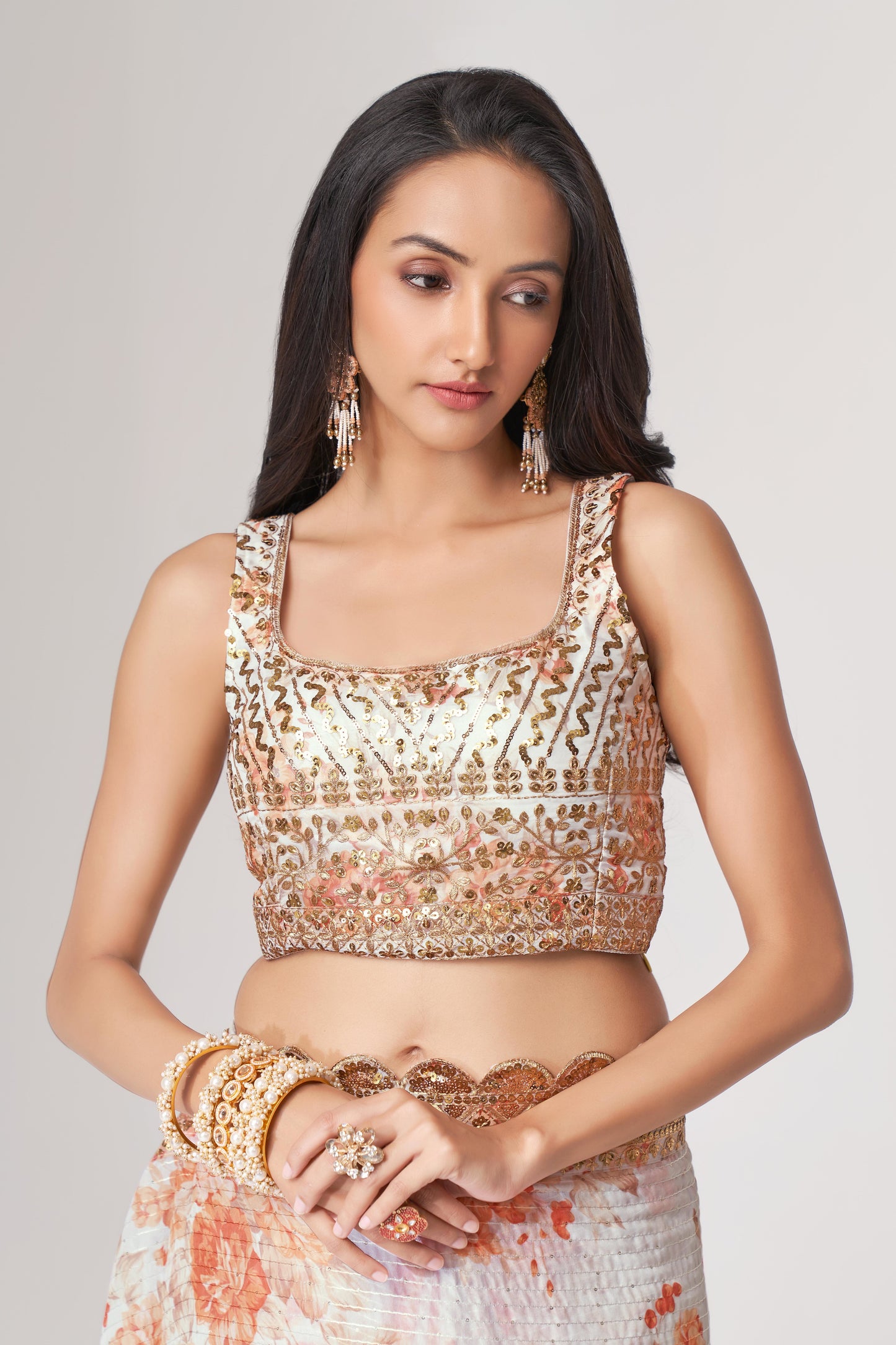 White Saree stands for purity and class – ideal for serene and sacred events.