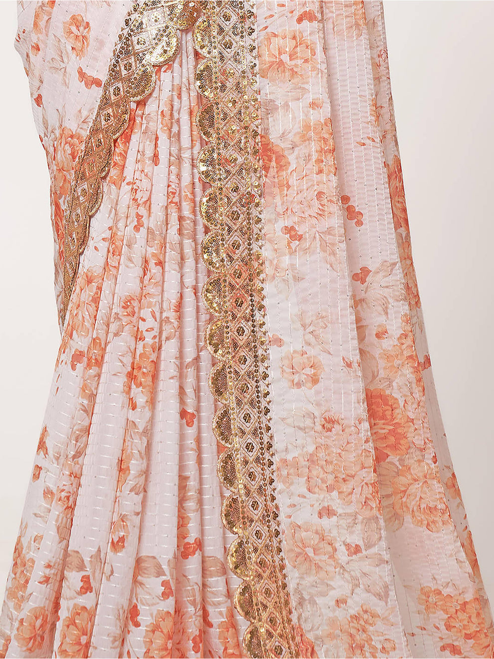 White Saree stands for purity and class – ideal for serene and sacred events.