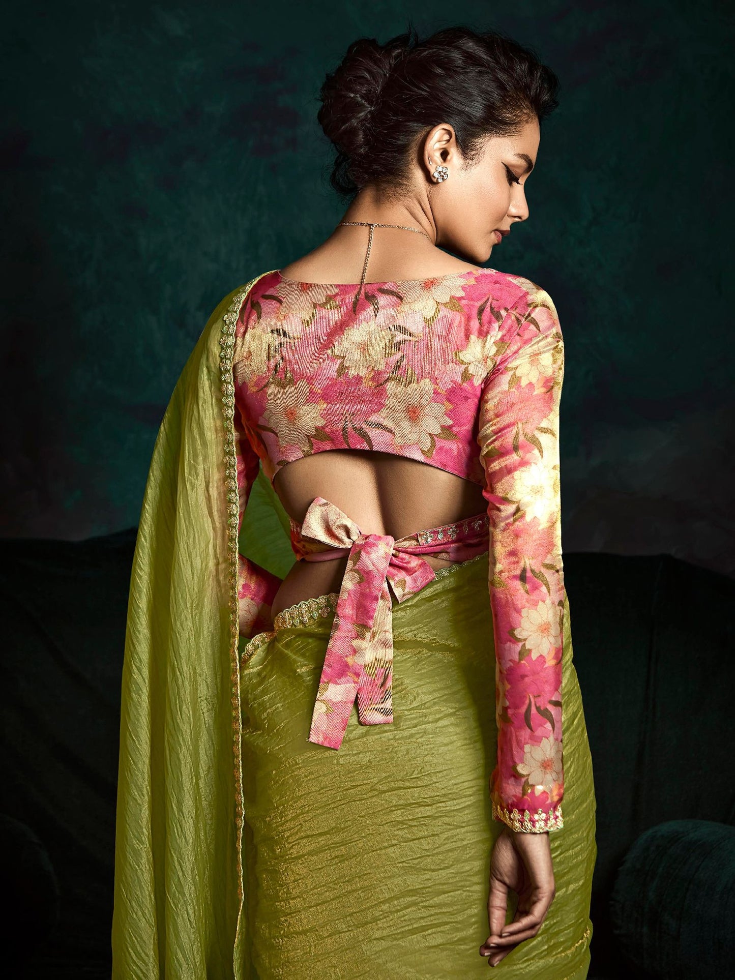 Green Saree symbolizes freshness and festivity – great for Mehndi or family gatherings.