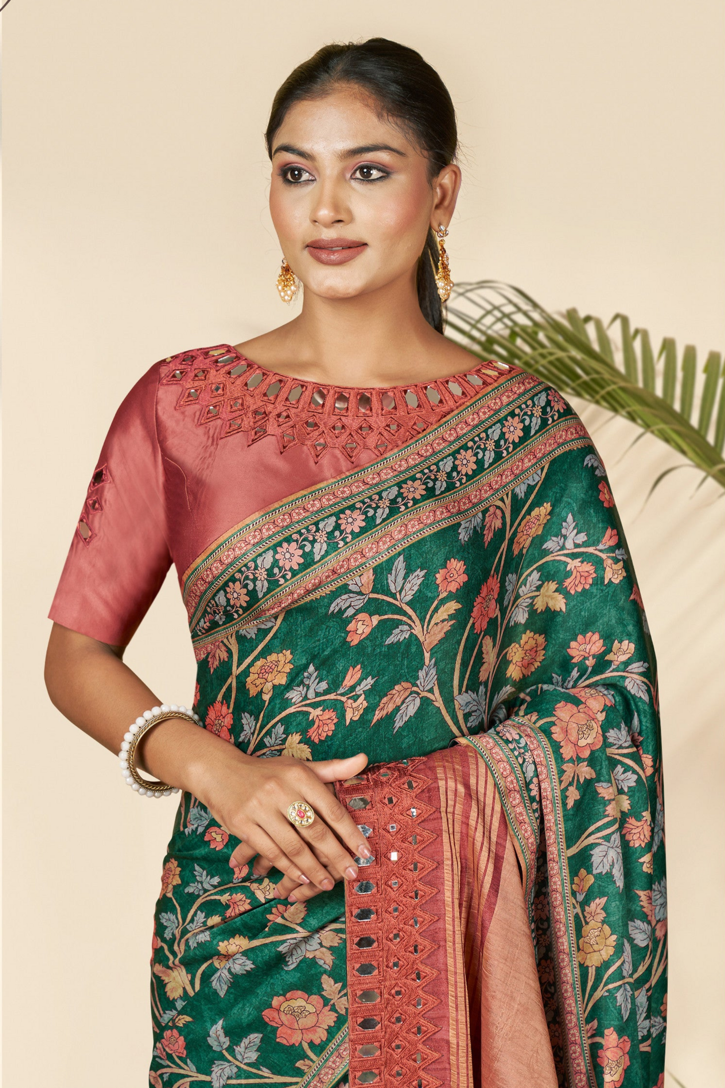 Green Saree symbolizes freshness and festivity – great for Mehndi or family gatherings.
