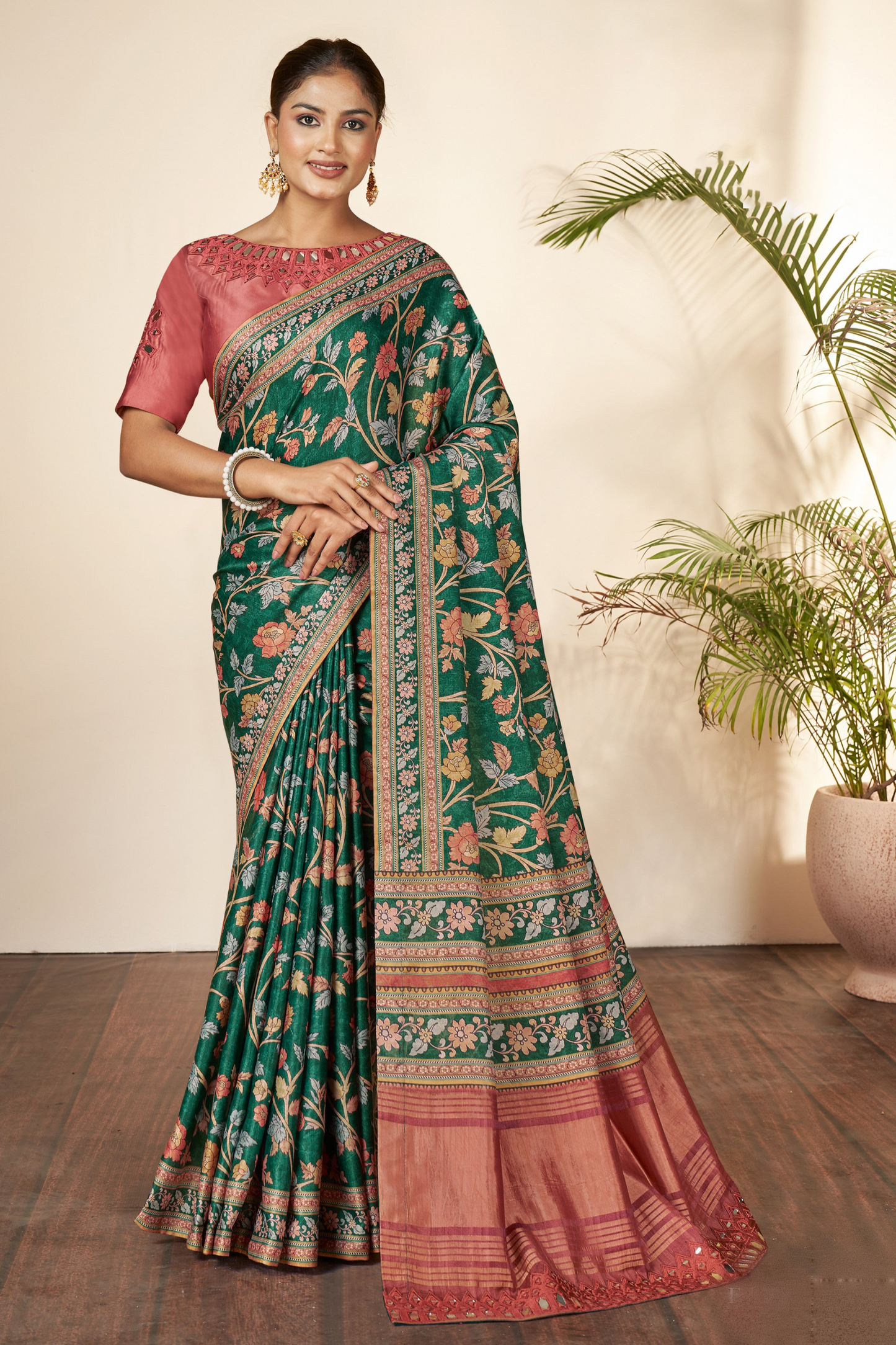 Green Saree symbolizes freshness and festivity – great for Mehndi or family gatherings.