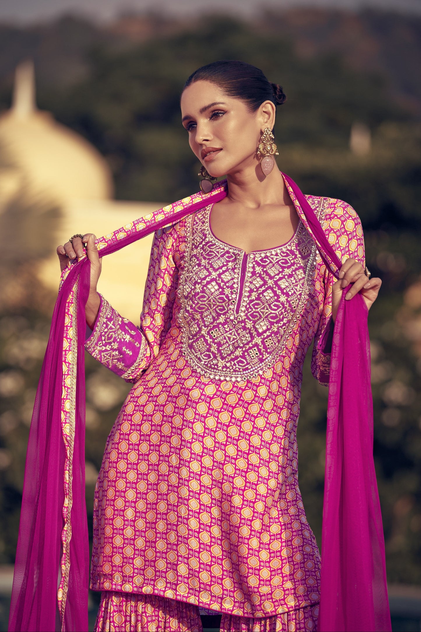 Light pink color sharara suit in Chinon silk fabric with delicate embroidery work, perfect for a graceful and festive ethnic look.