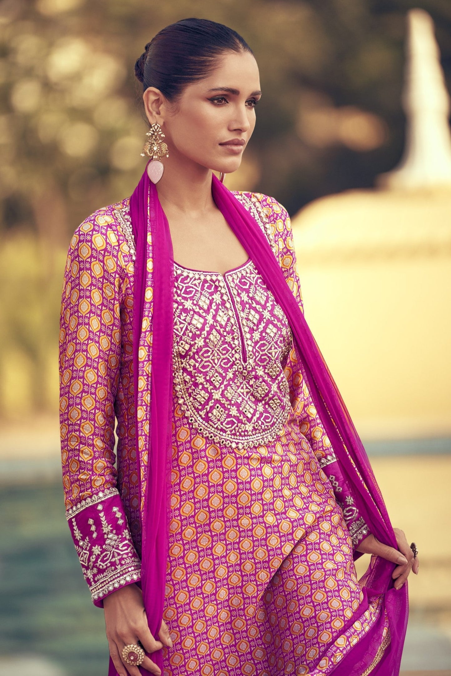 Light pink color sharara suit in Chinon silk fabric with delicate embroidery work, perfect for a graceful and festive ethnic look.