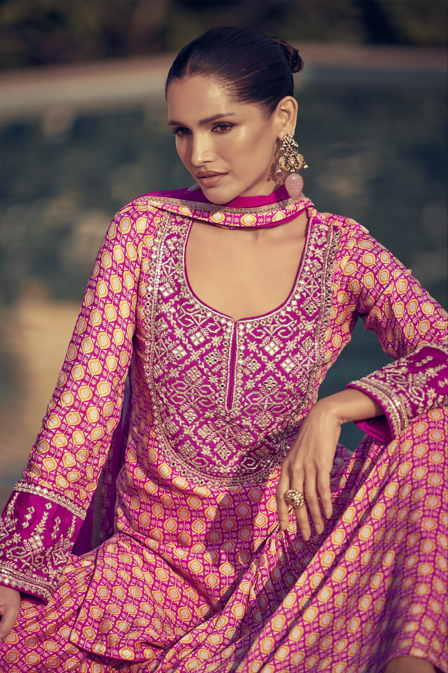 Light pink color sharara suit in Chinon silk fabric with delicate embroidery work, perfect for a graceful and festive ethnic look.