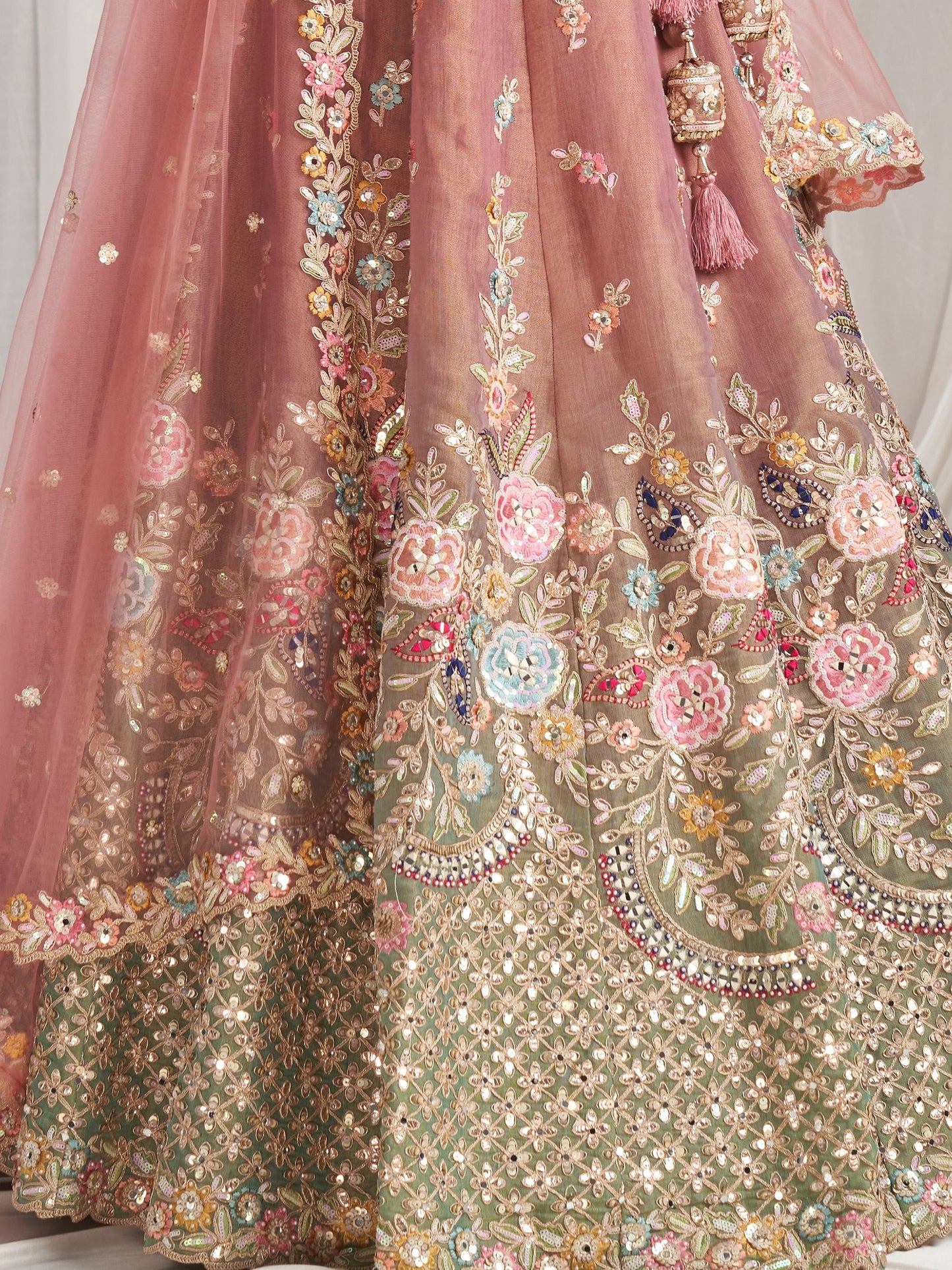 Pink bridal silk lehenga with mirror work luxury design