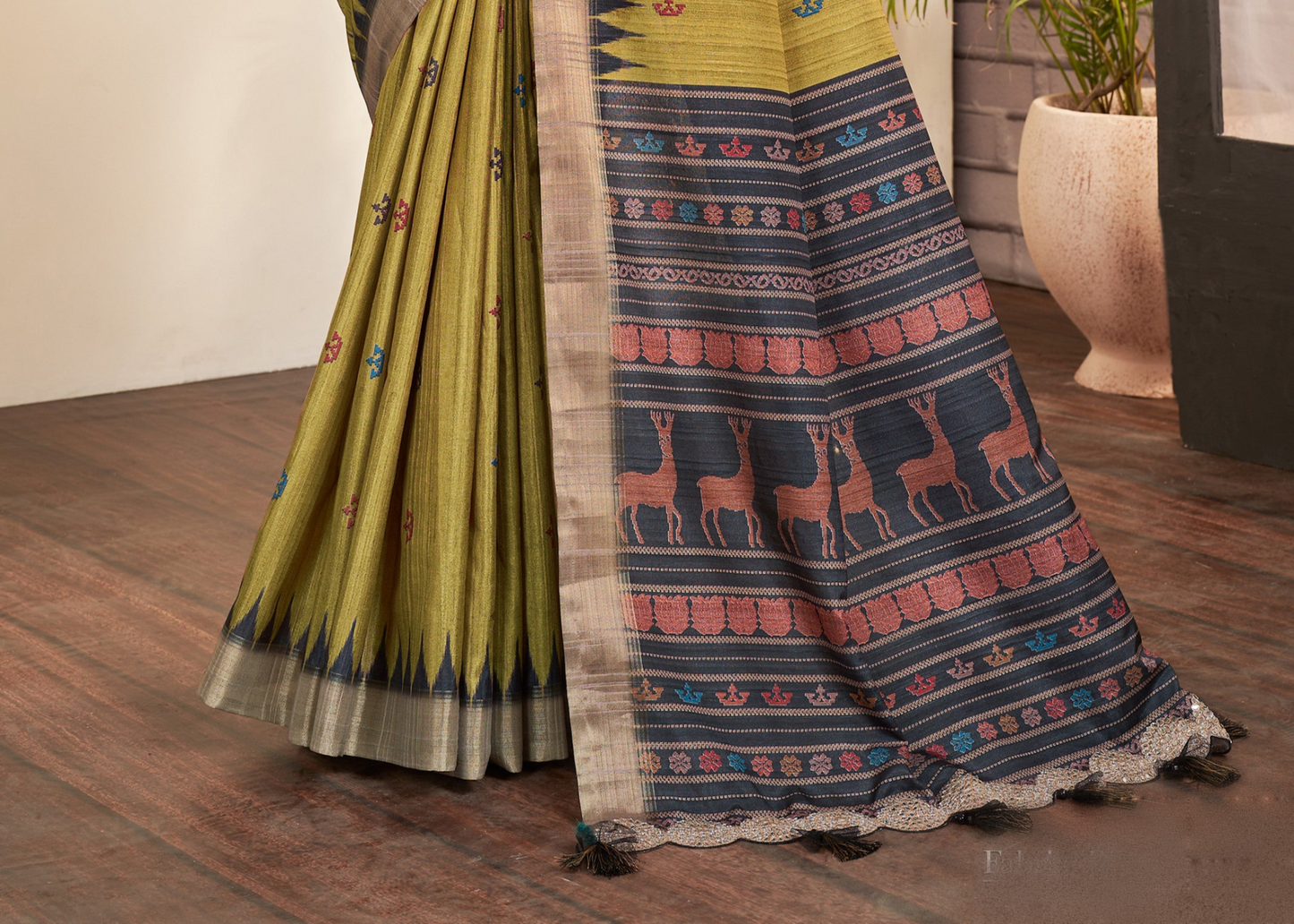 Yellow ethnic gaji silk saree with handwork and stitched blouse.