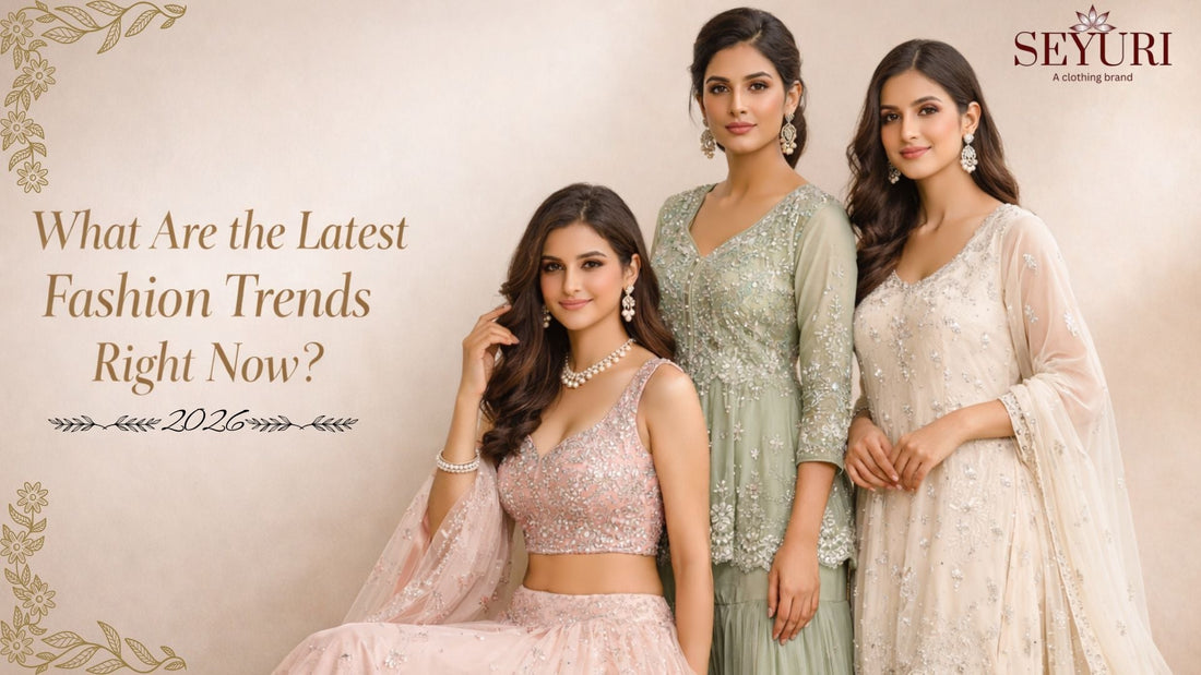 Three women wearing modern Indian clothes including a pastel lehenga, sharara set, and elegant Eid dress, showcasing the latest Indian fashion trends against a soft neutral background.