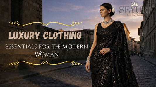 women wearing black saree with mirrro work