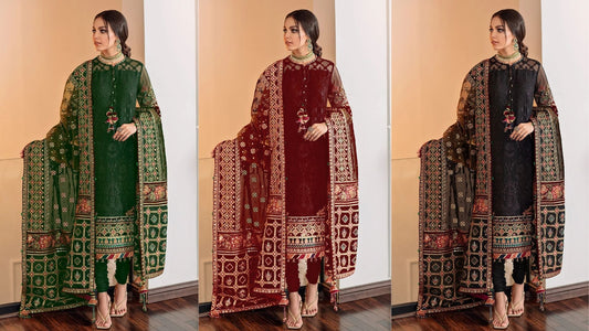 ree elegant women wearing intricately embroidered green, maroon, and black ethnic suits with detailed dupattas, showcasing luxurious festive fashion