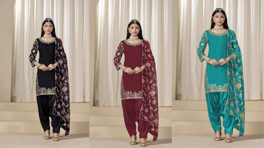 Three Punjabi suits in black, maroon, and teal with embroidered dupattas. SEYURI ethnic wear collection
