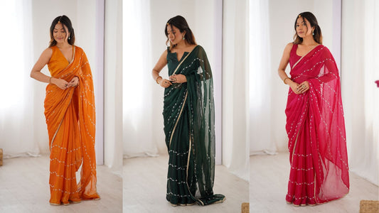 A woman models three elegant lightweight sarees orange, deep green, and pink each featuring delicate sequined lines and minimal gold borders, styled in a bright, soft lit indoor setting.