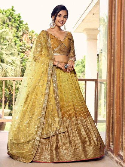 Bollywood Style Ochre Color Chinon Fabric Designer And Luxuru Lehenga With Net Dupatta