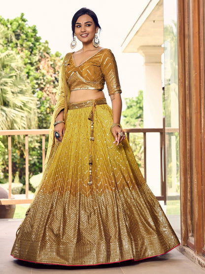 Bollywood Style Ochre Color Chinon Fabric Designer And Luxuru Lehenga With Net Dupatta
