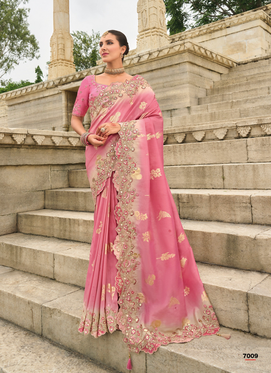 Stunning pink Gadwal silk saree with magenta blouse and handwork.