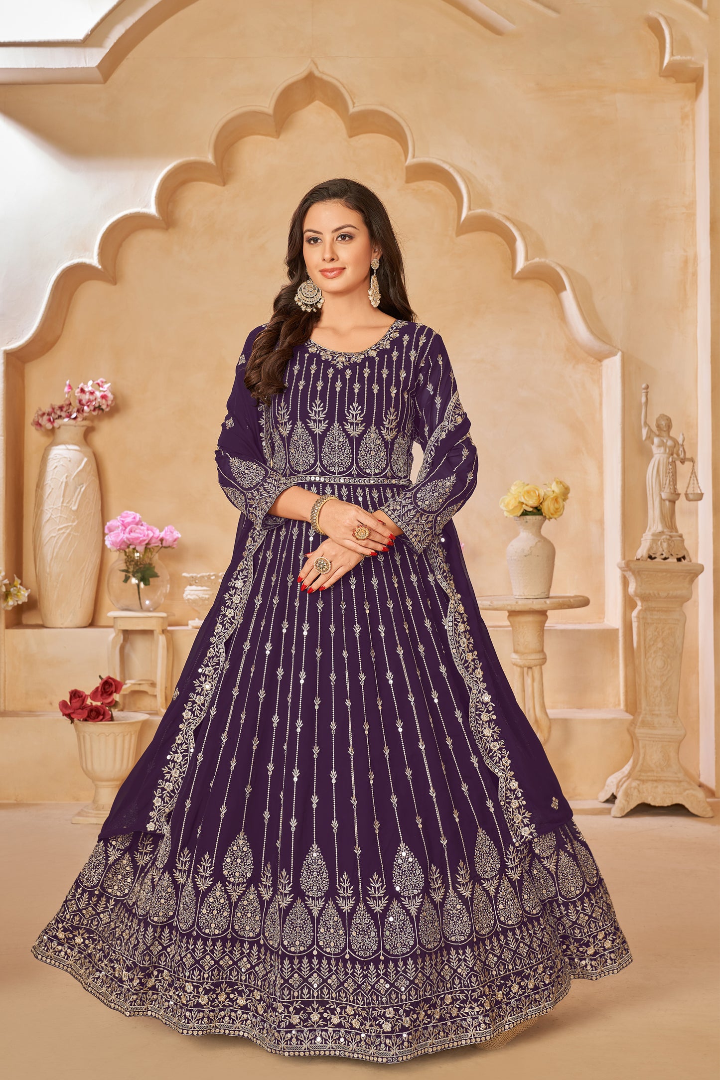 A Woman Modeling Purple Anarkali Dupatta Gown Suit With Embroidery Work