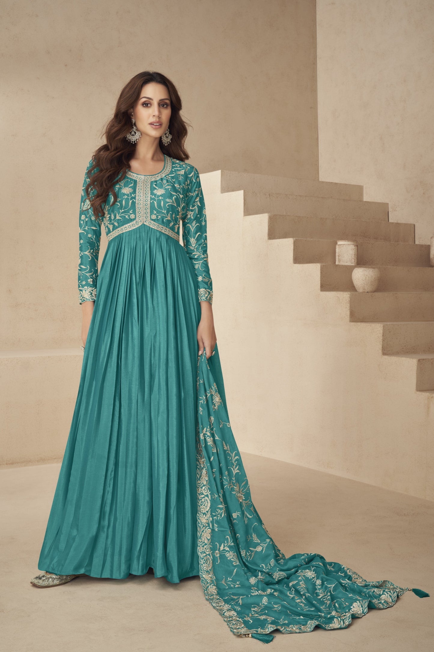 Stunning teal blue gown with a rich and elegant look, perfect for receptions, evening parties, and festive occasions.
