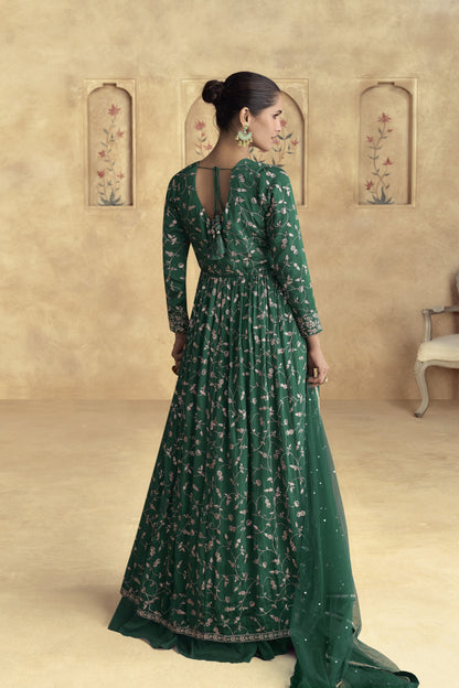 Dark green Anarkali gown with a regal and elegant look, perfect for mehndi functions, evening parties, and traditional celebrations.
