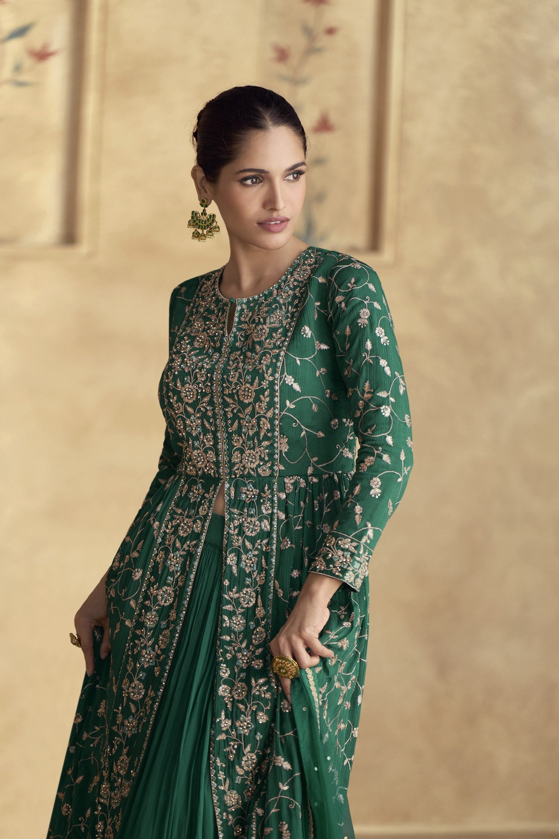 Dark green Anarkali gown with a regal and elegant look, perfect for mehndi functions, evening parties, and traditional celebrations.
