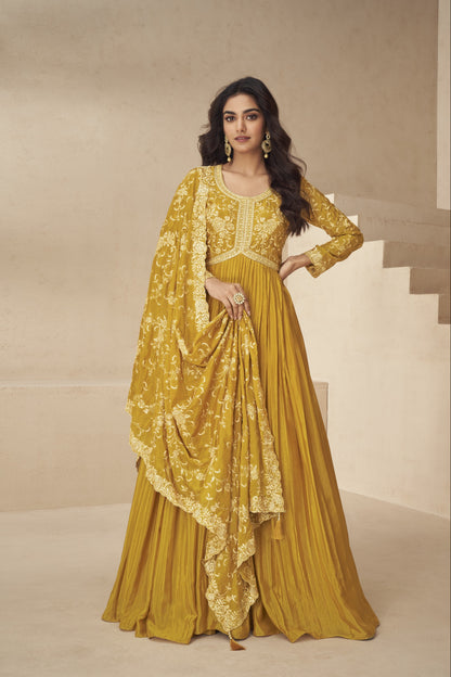Vibrant yellow gown with elegant detailing, perfect for haldi functions, festive events, and summer celebrations.
