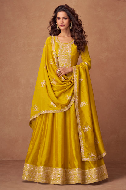 Yellow color Anarkali gown radiates warmth and charm, ideal for Haldi functions, daytime events, and festive occasions.
