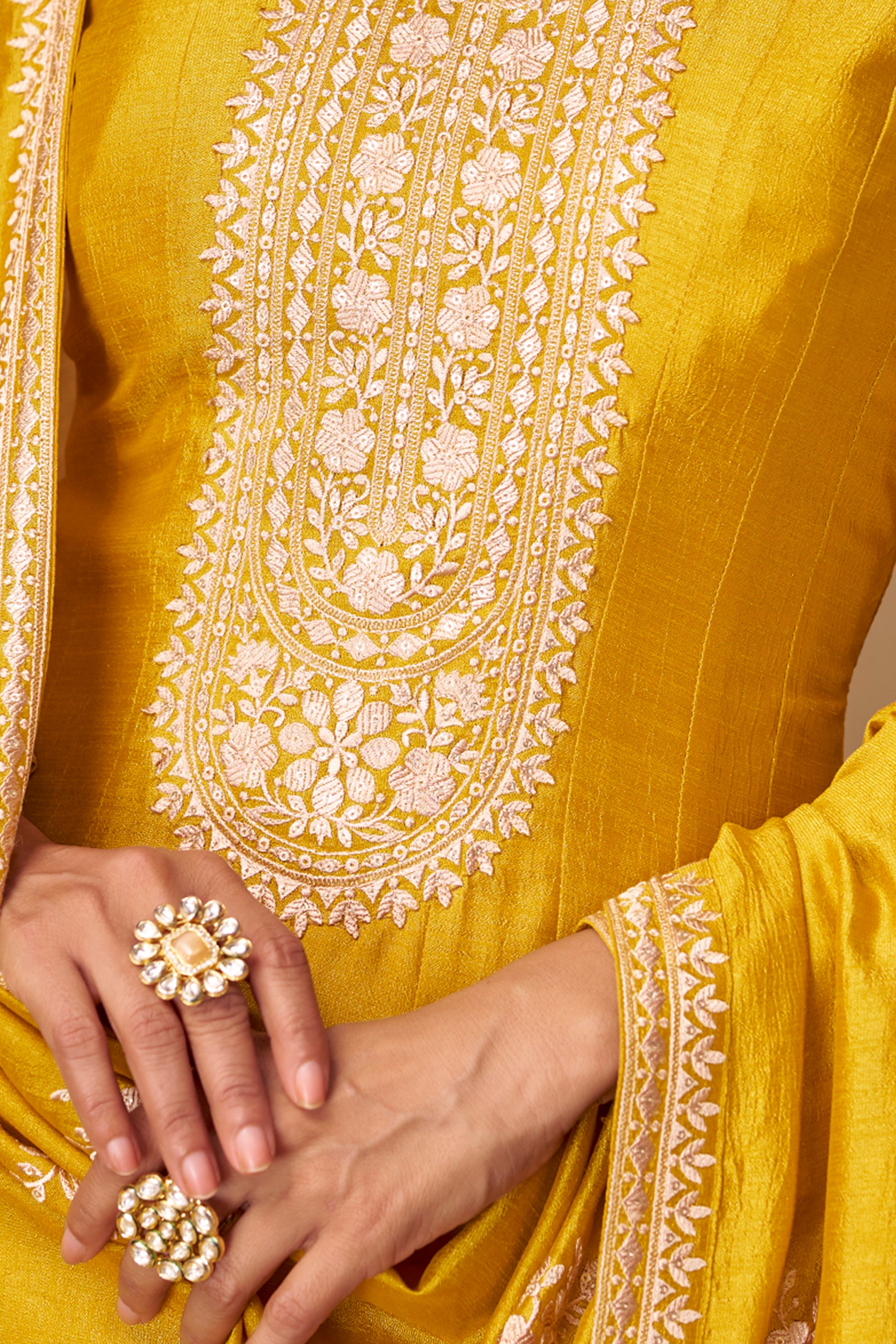 Yellow color Anarkali gown radiates warmth and charm, ideal for Haldi functions, daytime events, and festive occasions.
