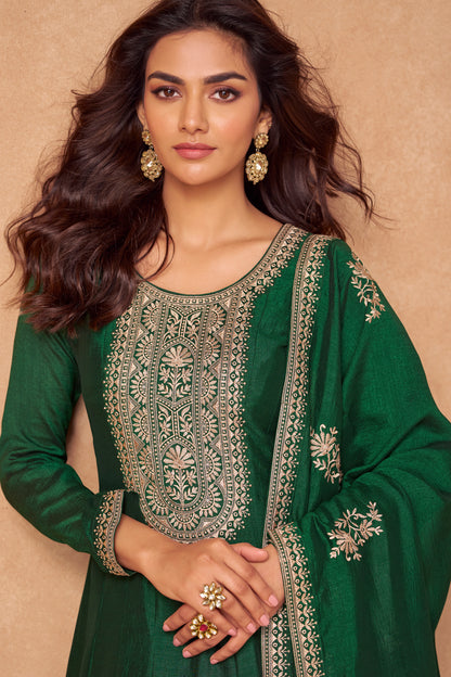 Dark green Anarkali gown offers a regal and graceful look, ideal for evening events, festive occasions, or weddings.
