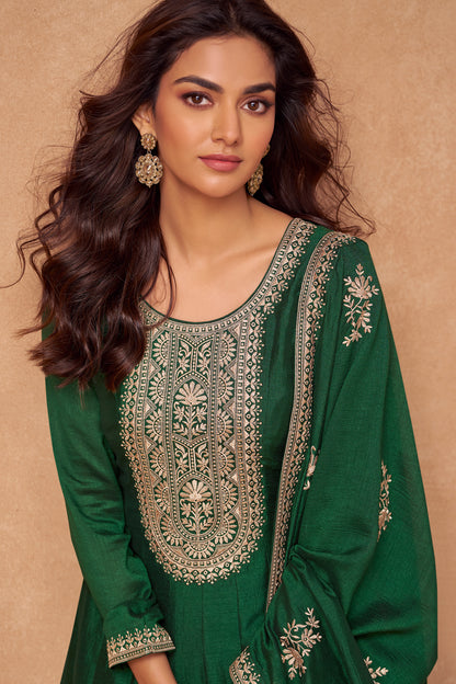 Dark green Anarkali gown offers a regal and graceful look, ideal for evening events, festive occasions, or weddings.
