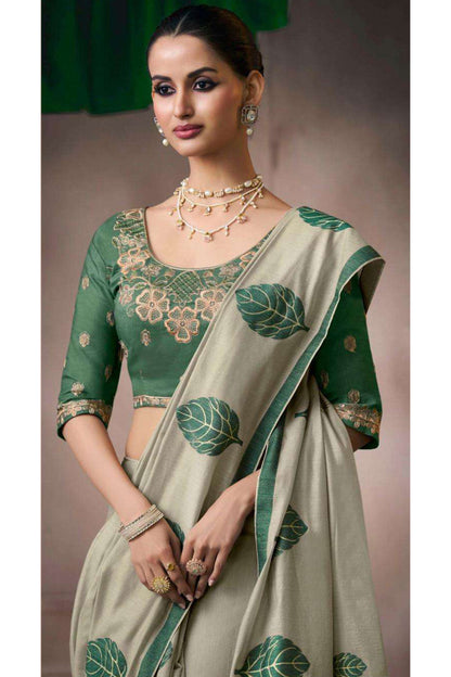 Close-Up Embroidery Detail On Green Organza Saree With Fancy Work and tast