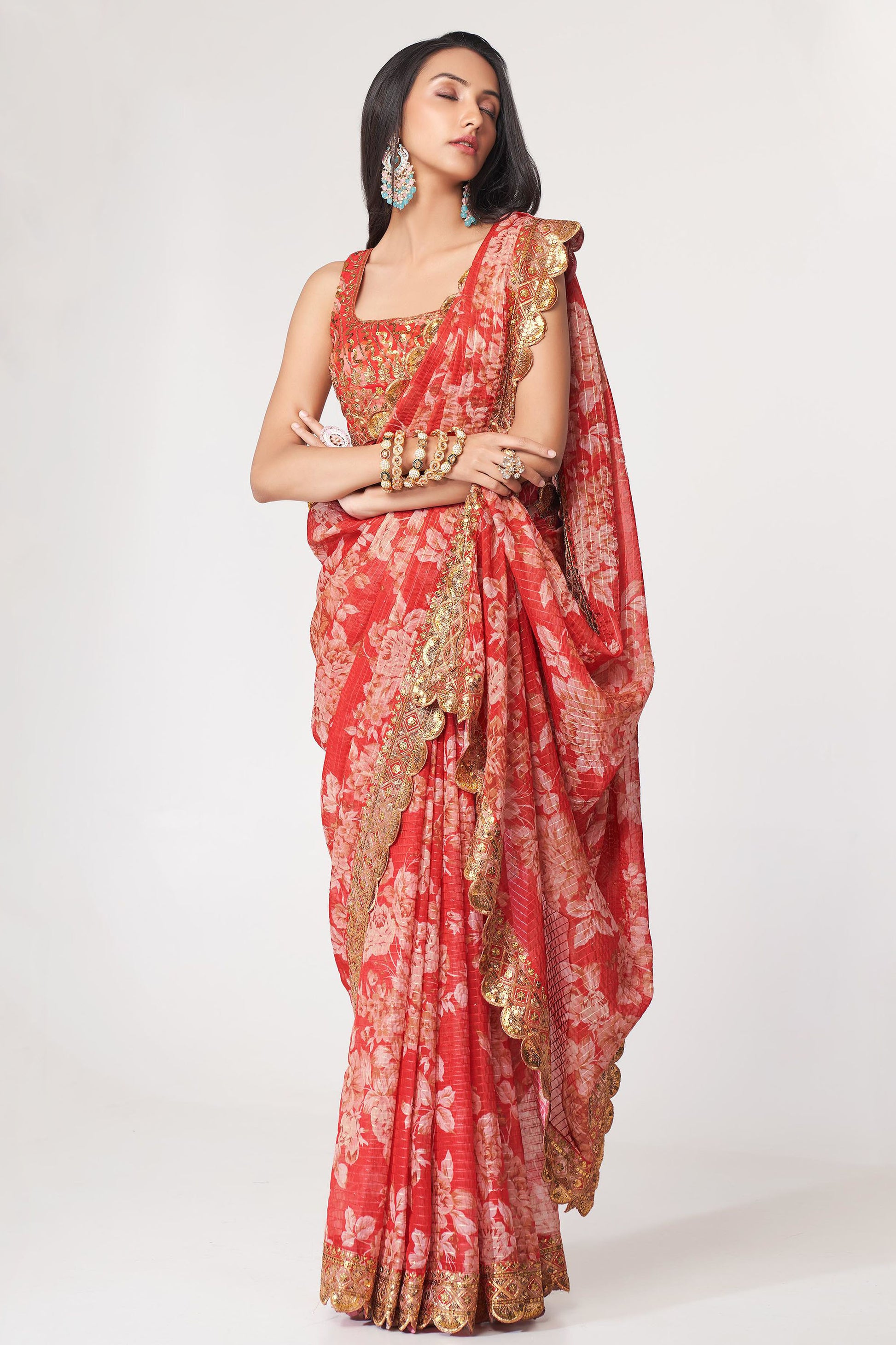 Red Saree speaks tradition and boldness – perfect for weddings and festive nights.
