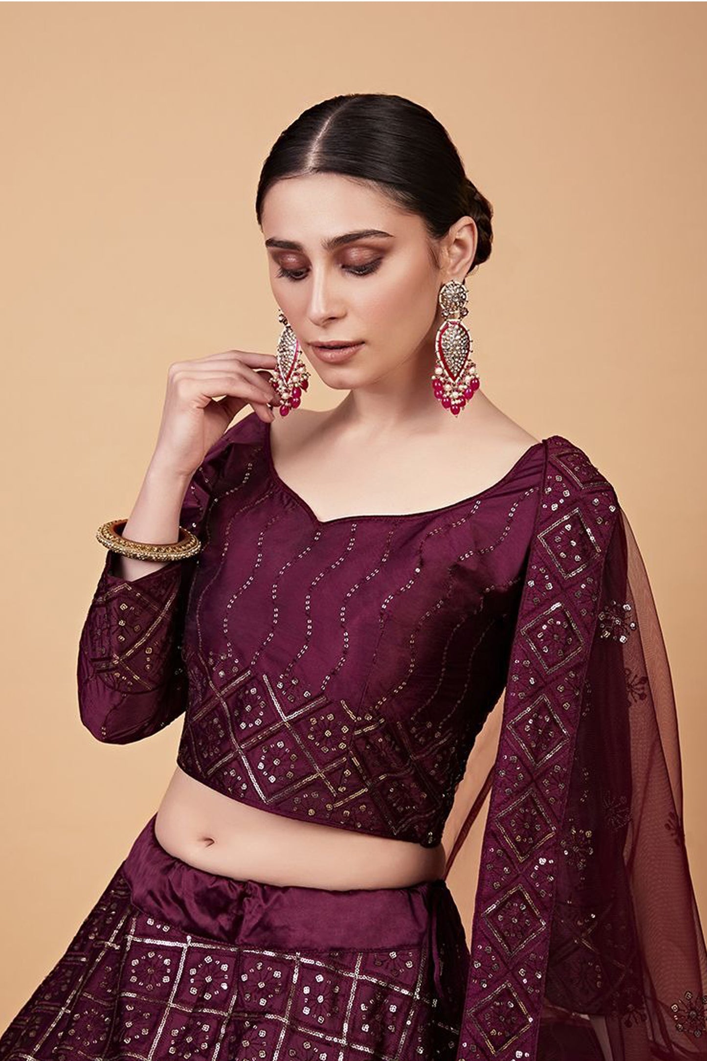 "Desi lehengas for American celebrations."
