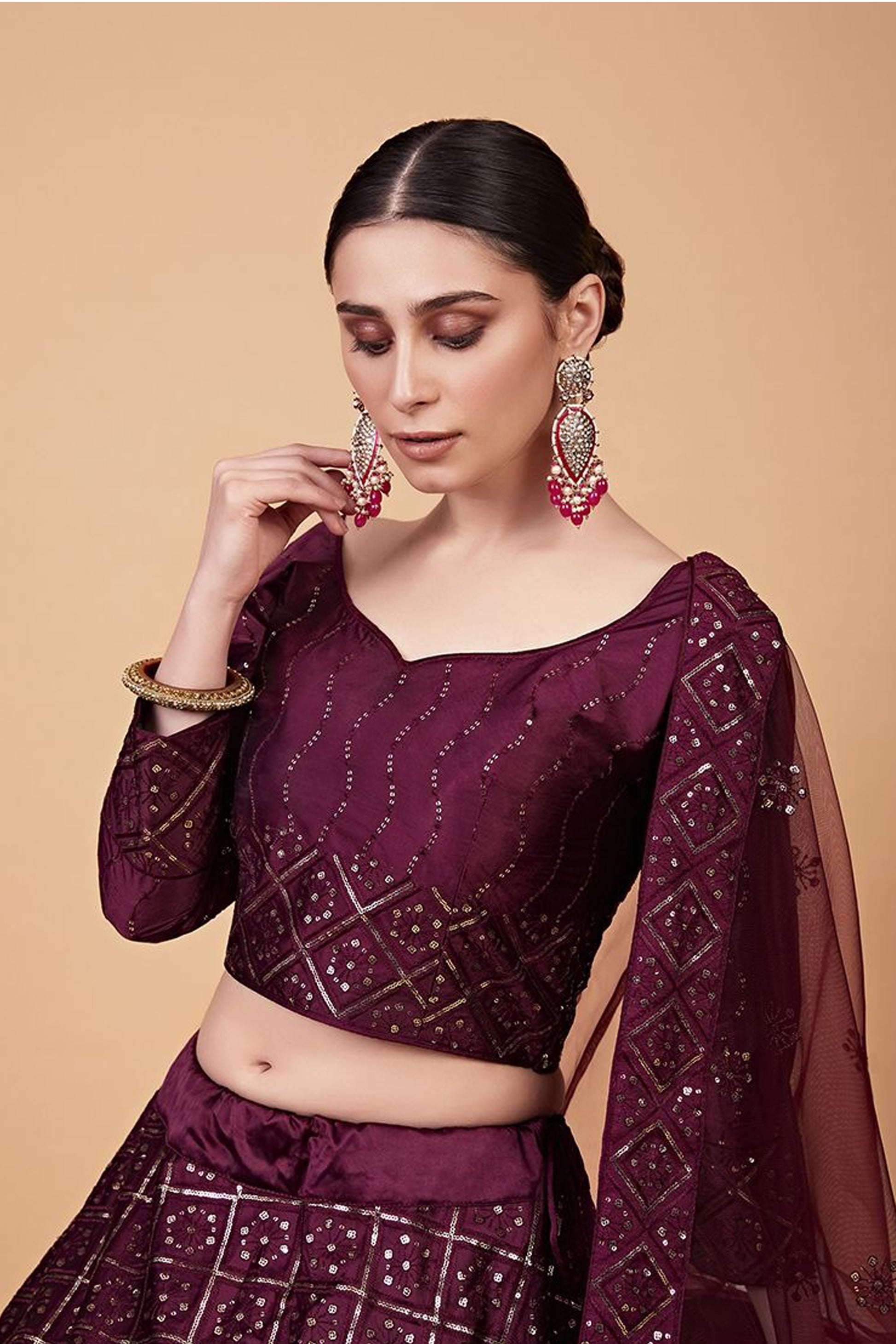 "Desi lehengas for American celebrations."

