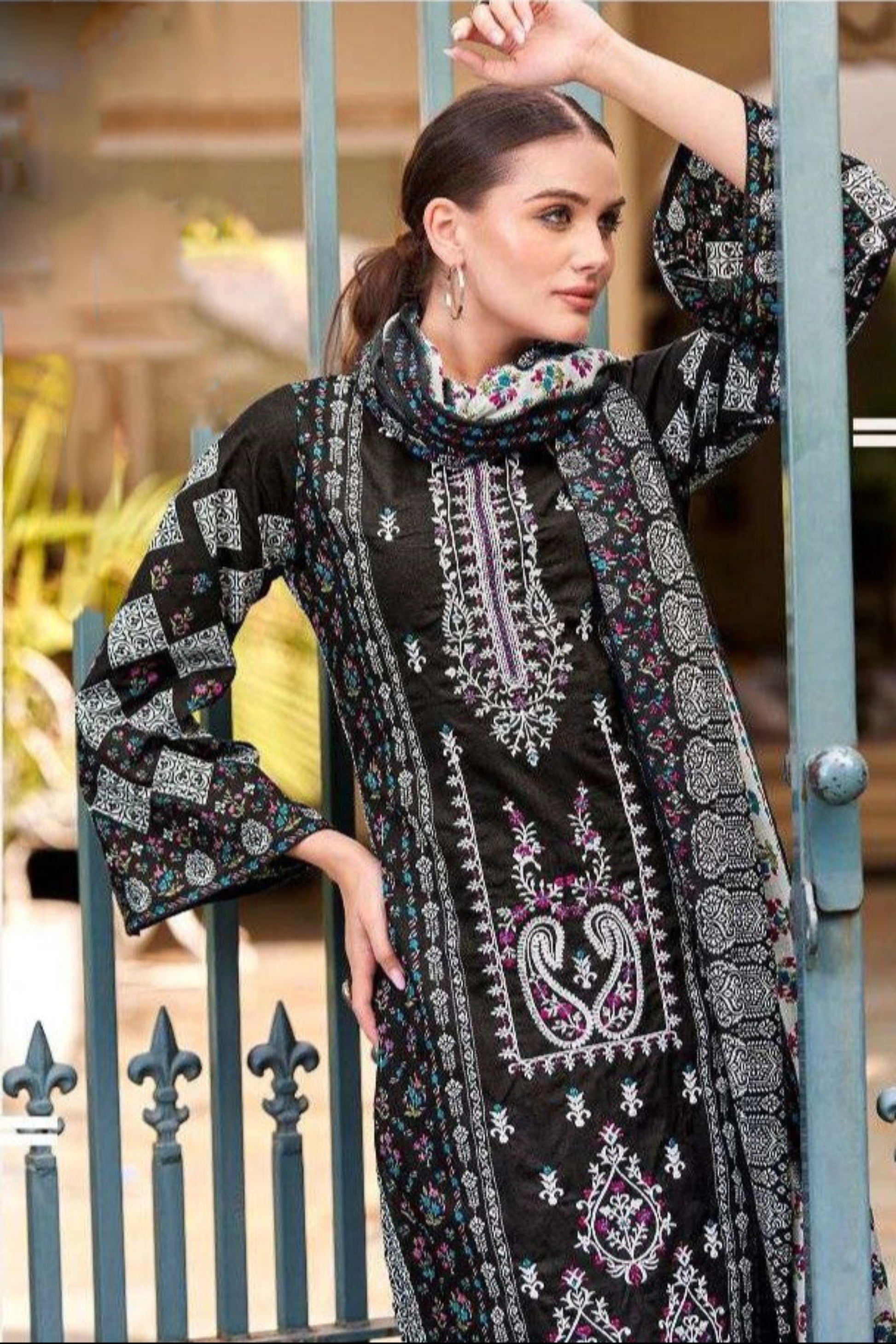 Stylish black cotton outfit with a modern ethnic charm, ideal for casual gatherings, workwear, and festive evenings.
