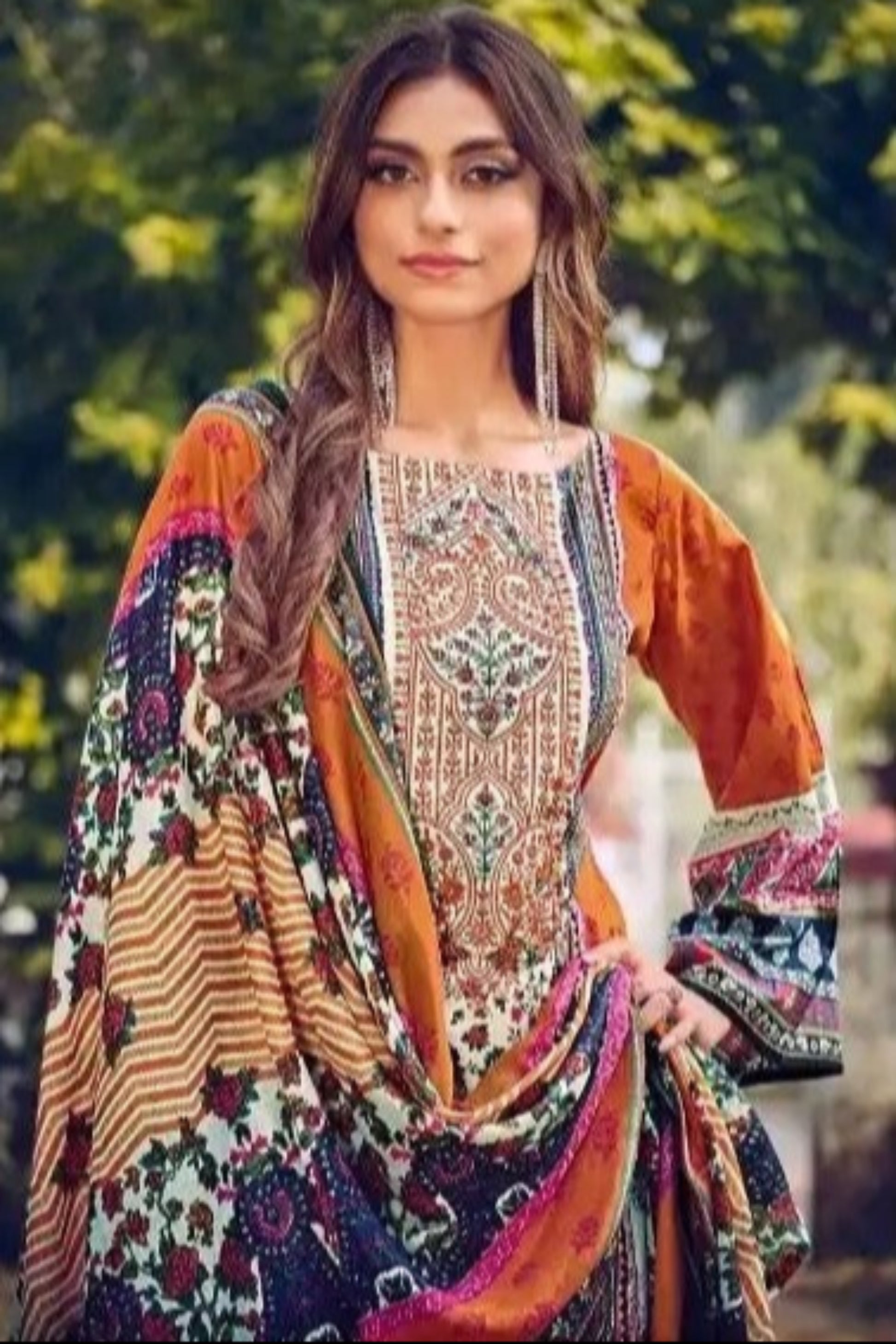 Dark orange cotton outfit with a bold and vibrant touch, ideal for festive occasions, cultural events, and daytime gatherings.
