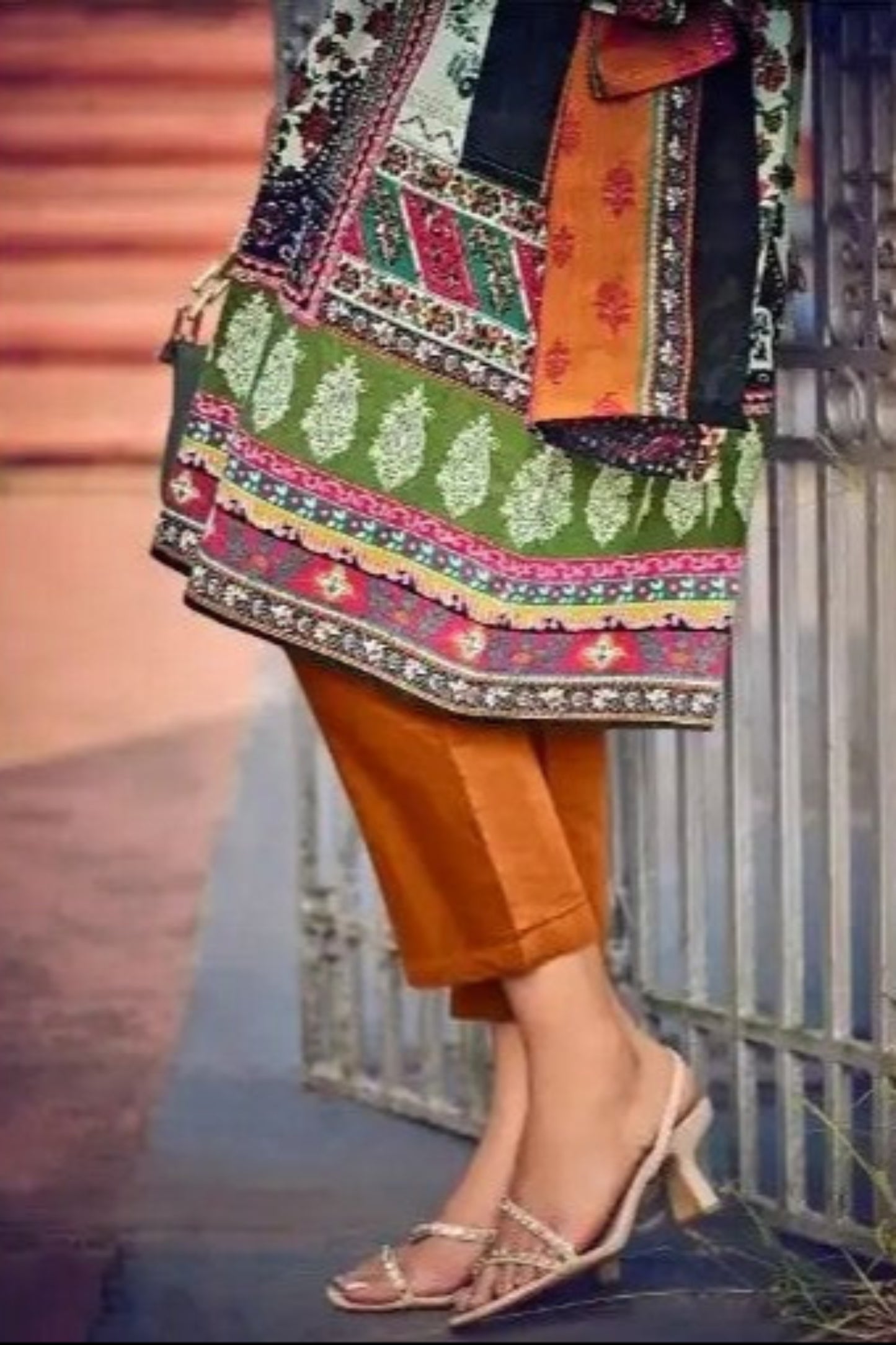 Dark orange cotton outfit with a bold and vibrant touch, ideal for festive occasions, cultural events, and daytime gatherings.
