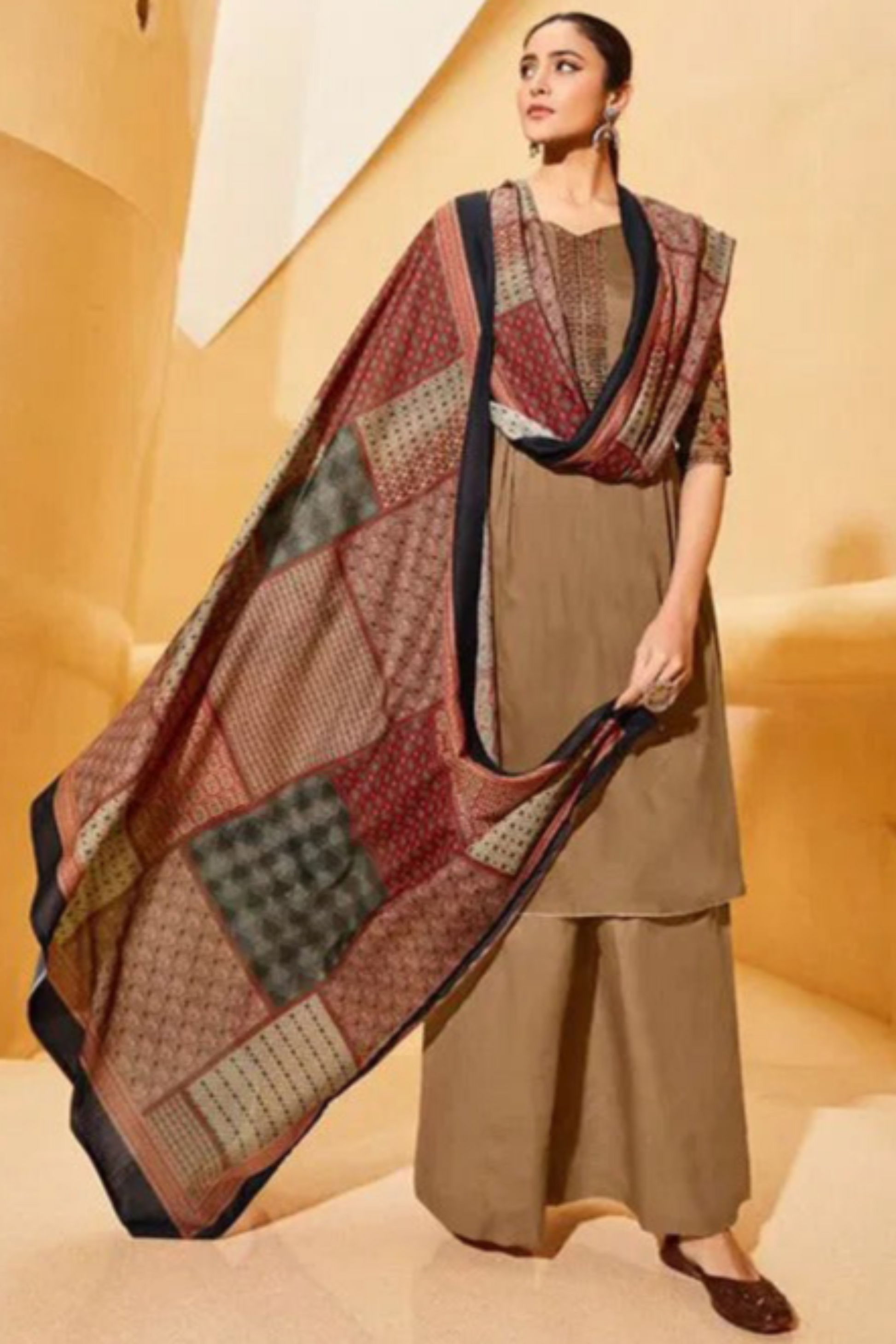 Brown cotton wear speaks tradition and boldness – perfect for weddings and festive nights.
