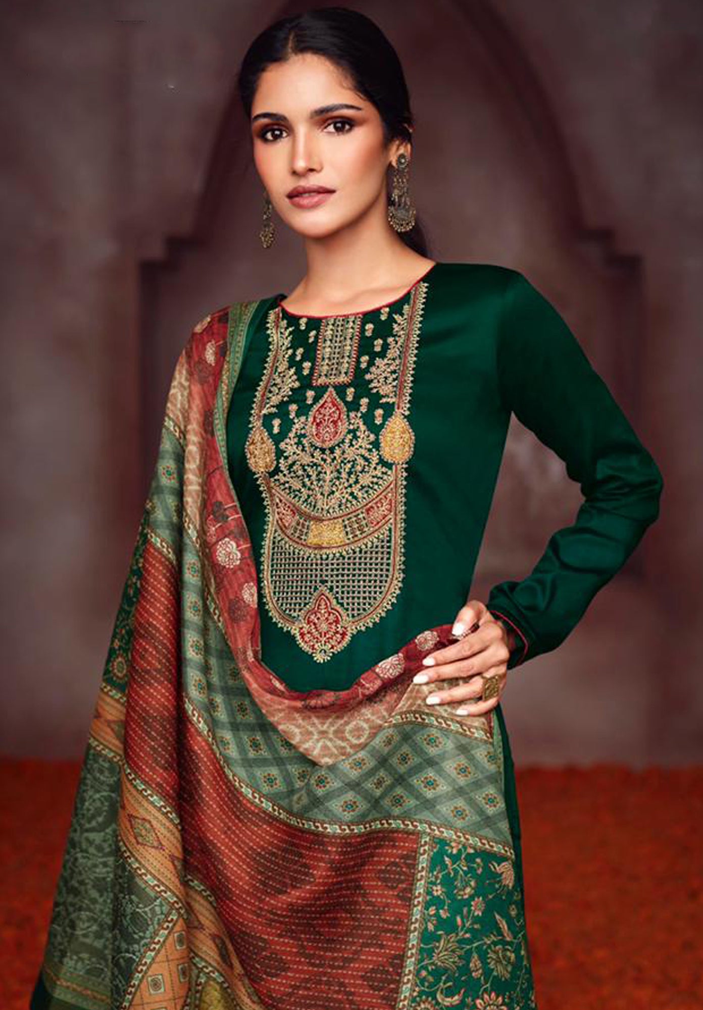 Green colour cotton wear symbolizes freshness and festivity – great for Mehndi or family gatherings.
