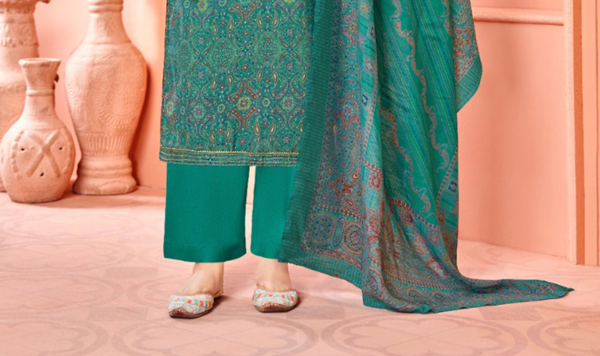Green colour cotton wear symbolizes freshness and festivity – great for Mehndi or family gatherings.
