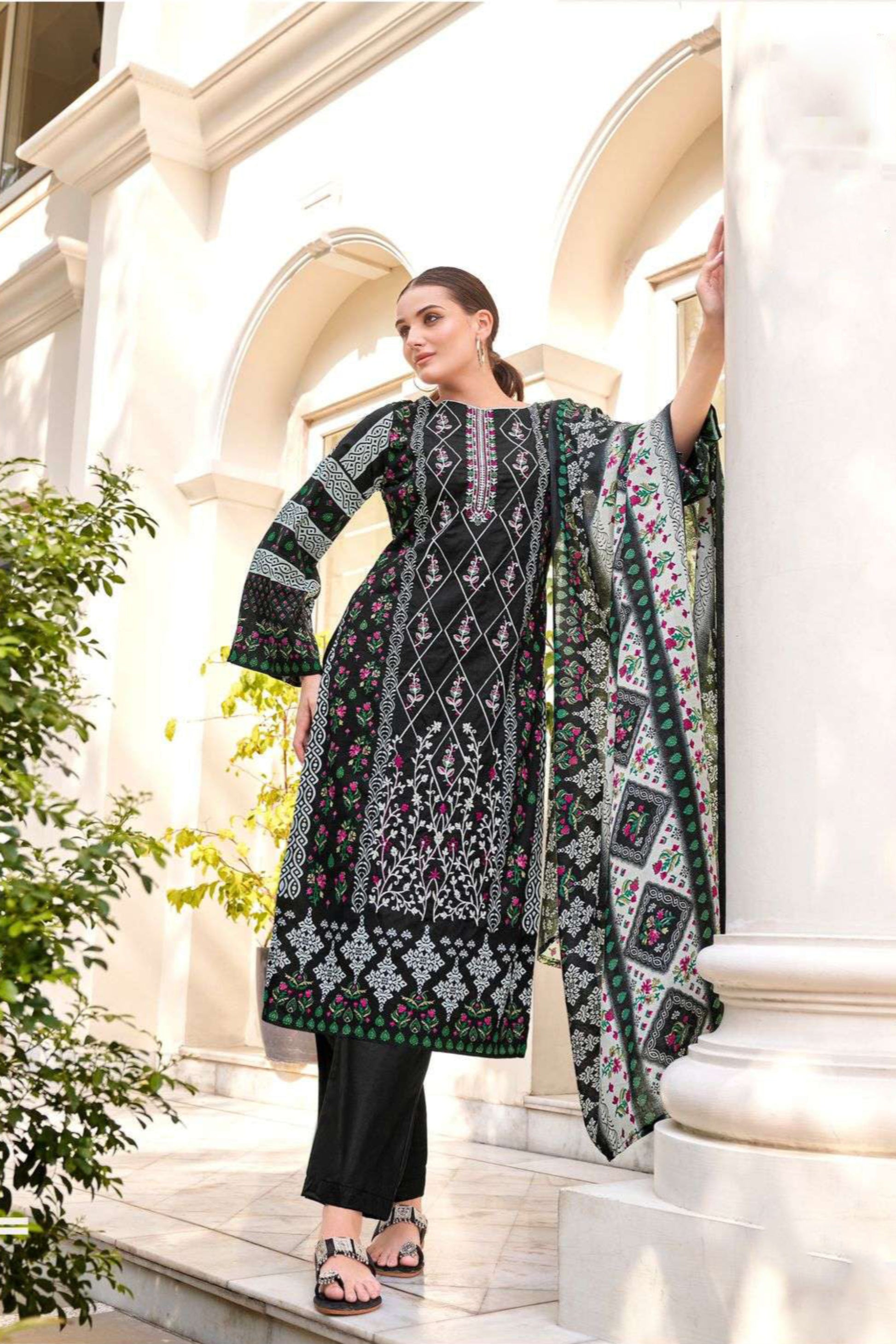 Classic black cotton outfit with a sleek and timeless appeal, perfect for everyday wear, evening outings, and festive occasions.
