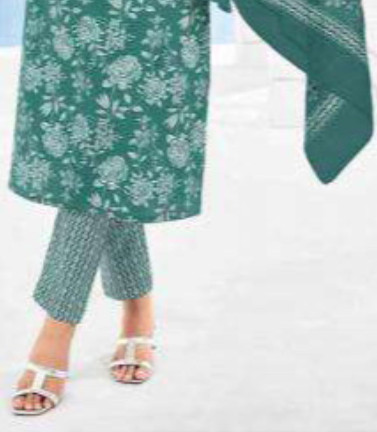 Teal blue cotton outfit with a cool and vibrant tone, ideal for summer days, festive occasions, and effortless everyday style.
